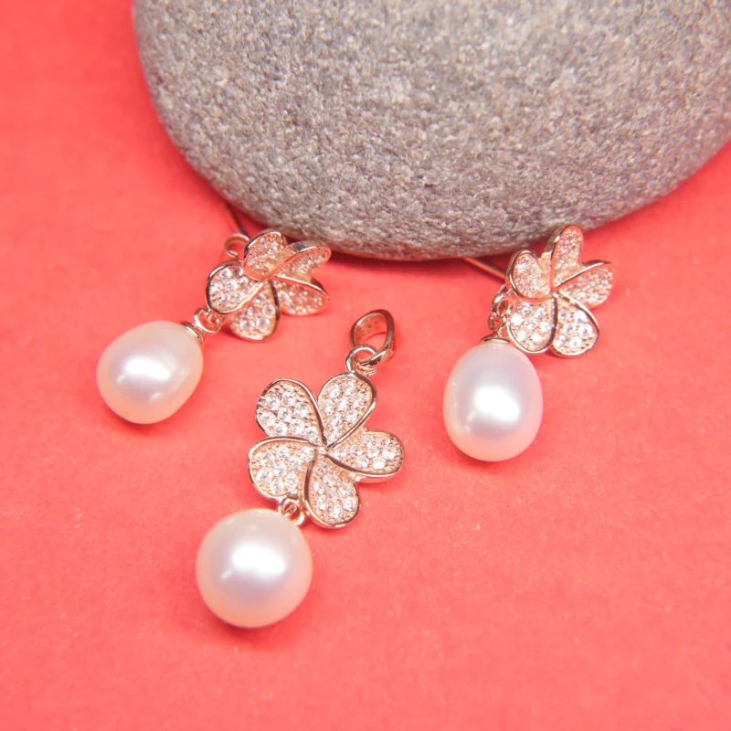 Elegant Sterling Silver Floral Pendant with Freshwater Pearl Drop