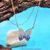 Elegant Silver Butterfly Pendant with Blue & White Stones on Chain