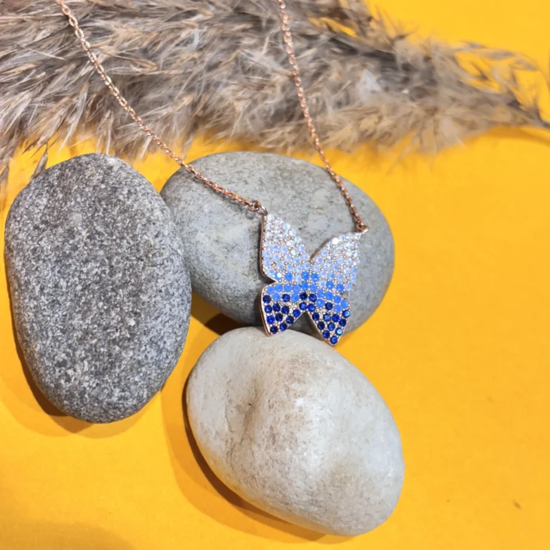Elegant Silver Butterfly Pendant with Blue & White Stones on Chain - Image 3