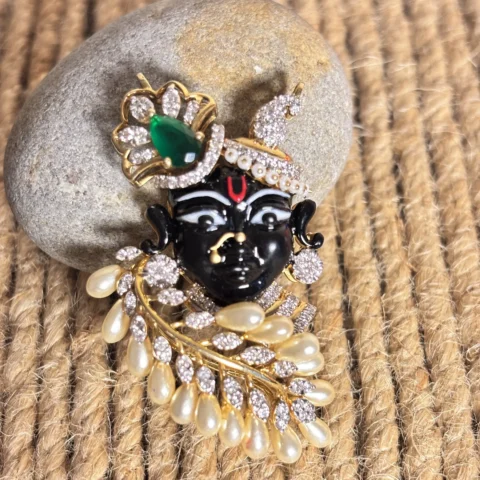 Divine Gold Diamond Pendant with Pearl & Emerald Detailing – Lord Krishna Inspired Design