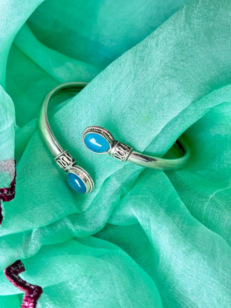 Elegant Silver Bracelet with Blue Gemstone Accents - Image 2