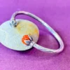 Stylish Silver Cuff Bracelet with Carved Red Stone Floral Design