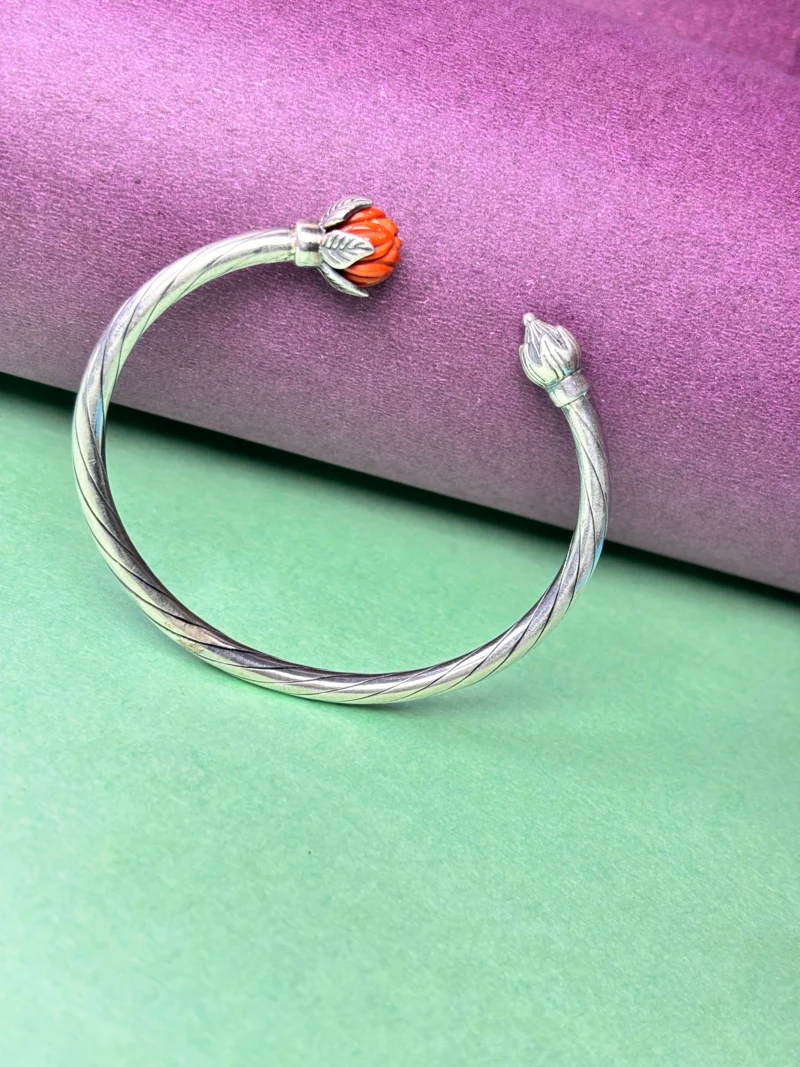 Stylish Silver Cuff Bracelet with Carved Red Stone Floral Design - Image 2