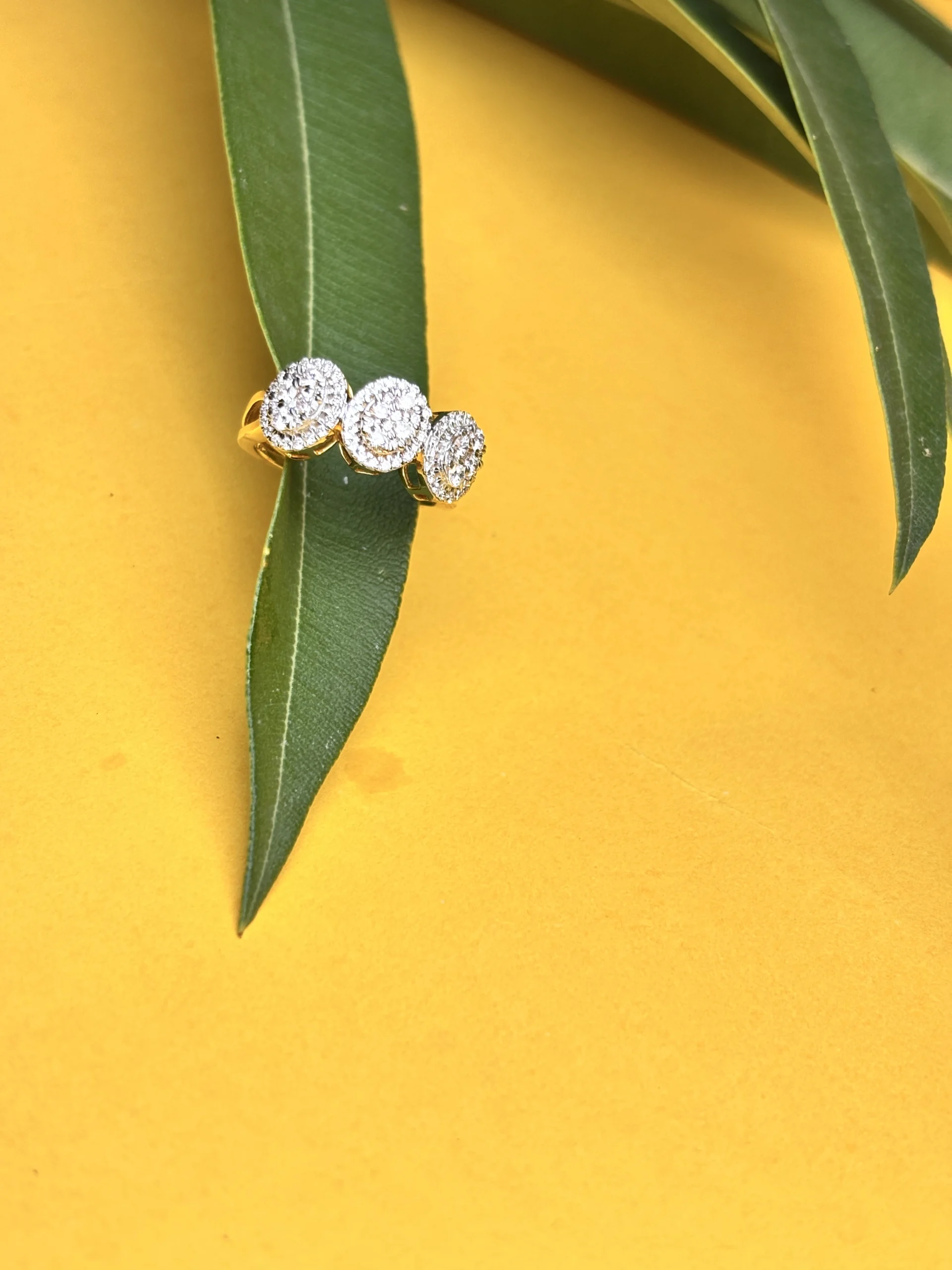 Triple Halo Diamond Ring in 18KT Gold