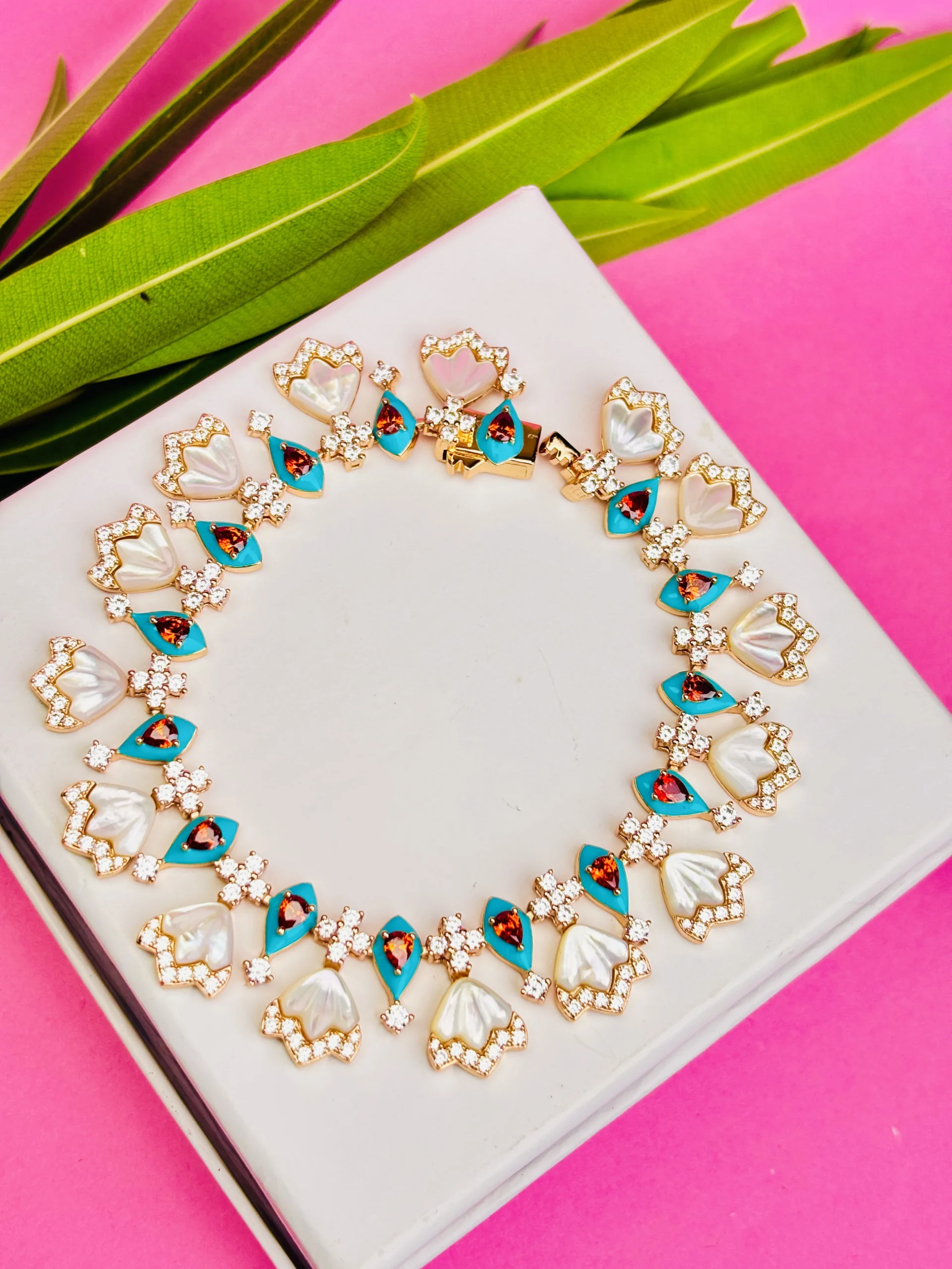 Elegant Silver Bracelet with Blue and Pearl Floral Charms