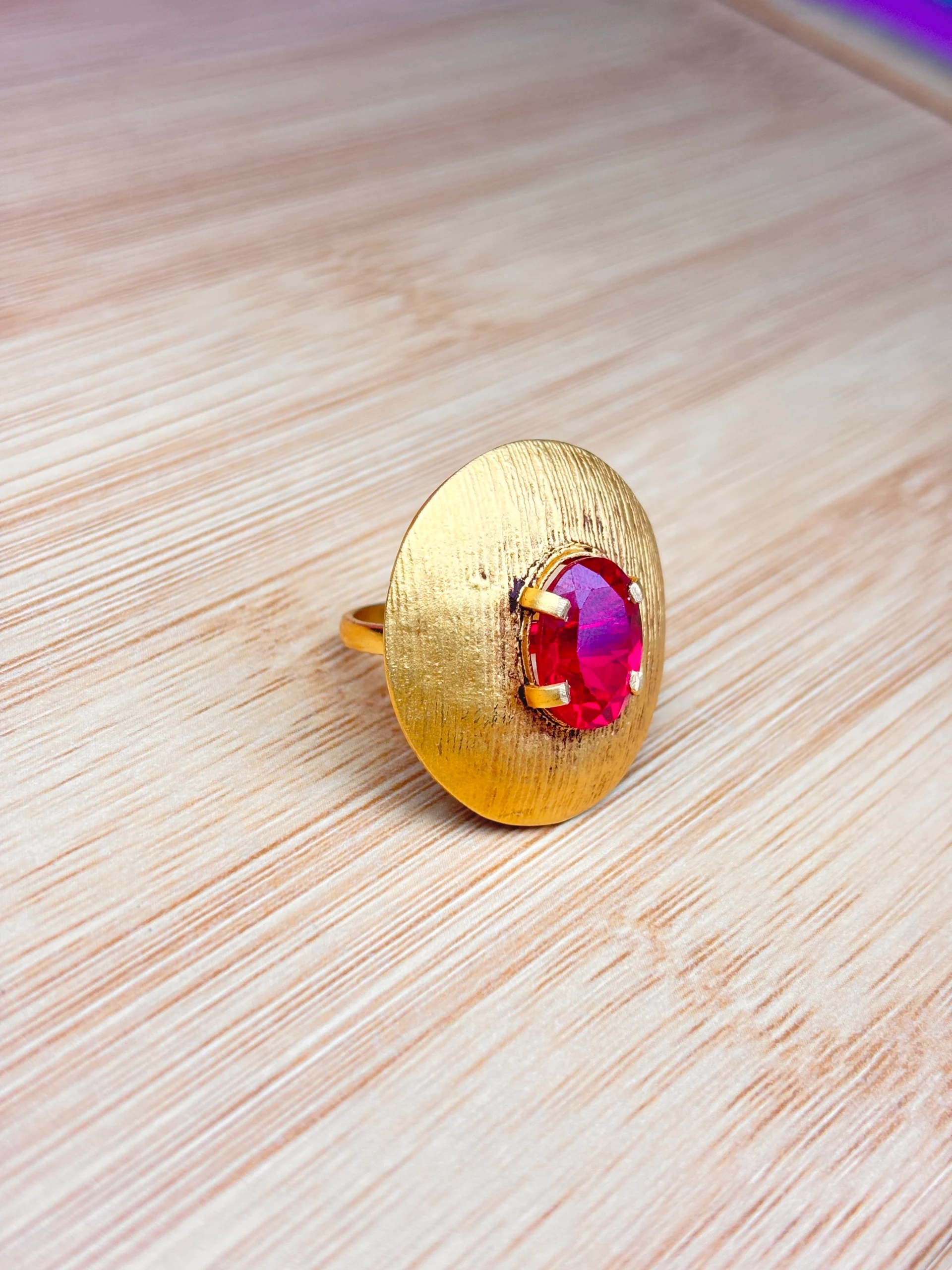 Elegant 22KT Matte Gold Ring with Ruby Pink Stone