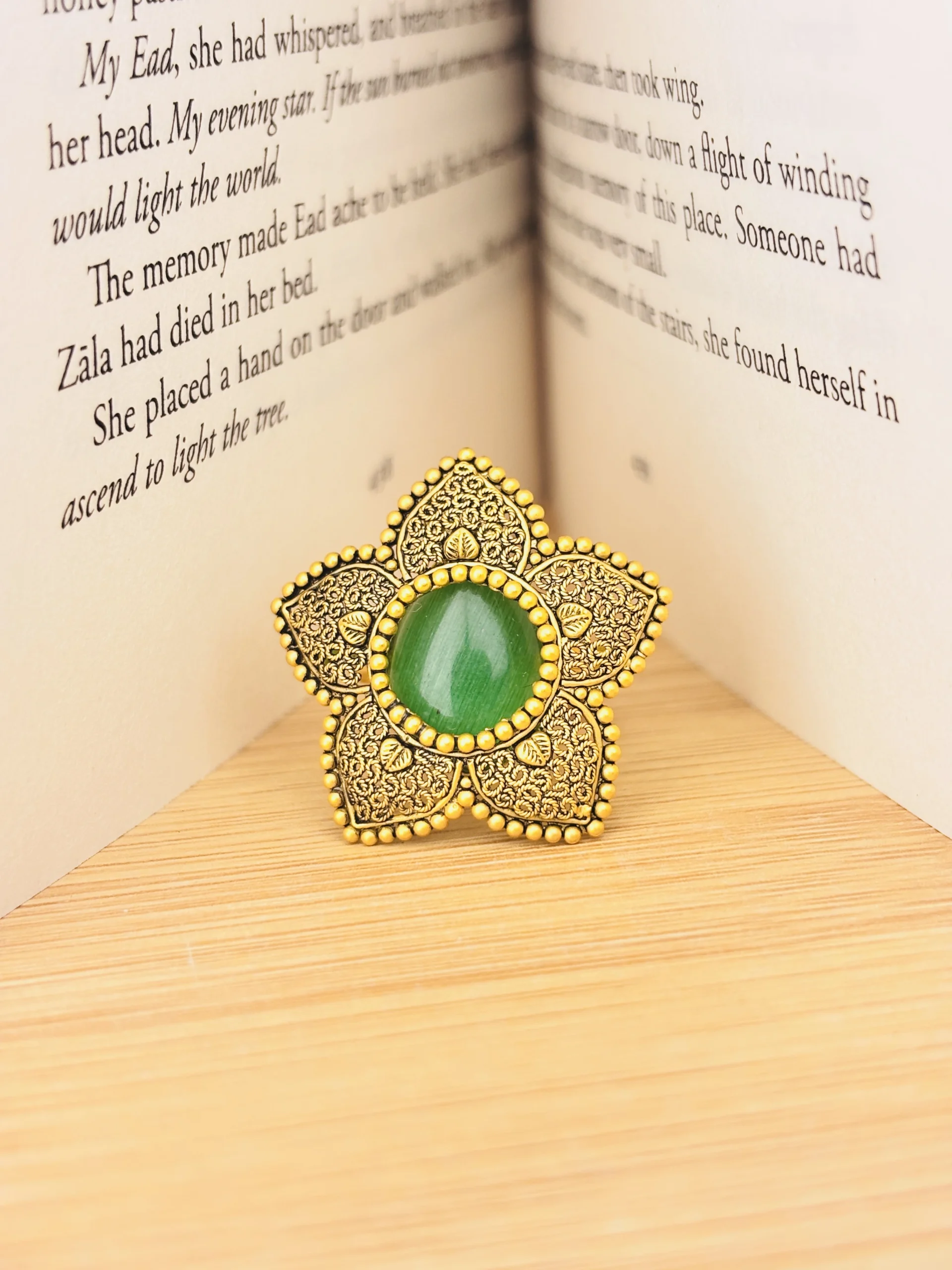 Exquisite 22kt Gold Floral Ring with Green Stone โ Handcrafted Heritage Elegance