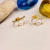 Graceful Triple Pearl Silver Earrings with Gold Finish