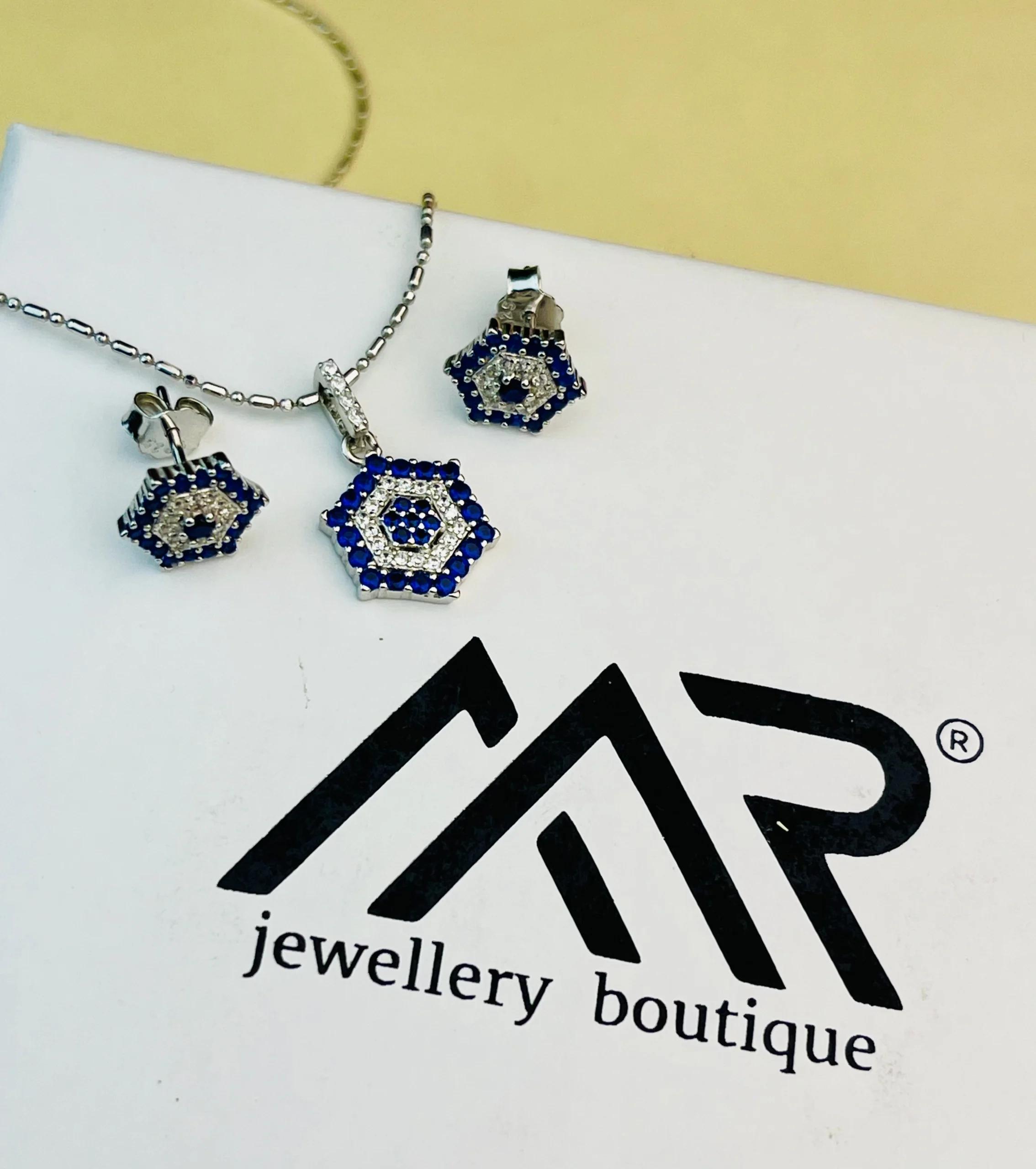 925 Sterling Silver Blue Stone Hexagon Pendant Set with Matching Stud Earrings