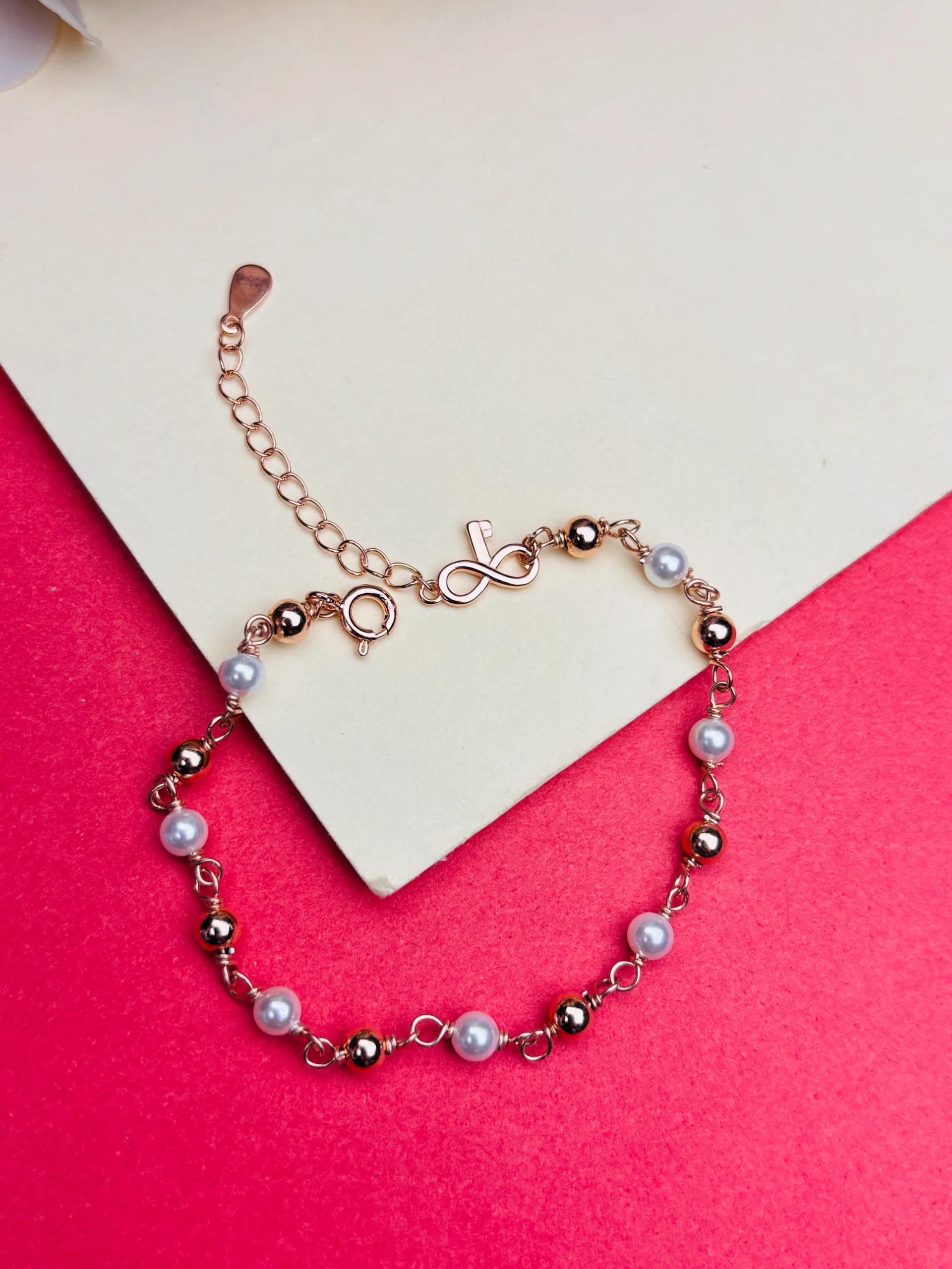 Rose Gold Infinity Pearl Charm Bracelet – Elegant Adjustable Beaded Bracelet for Women - Image 3